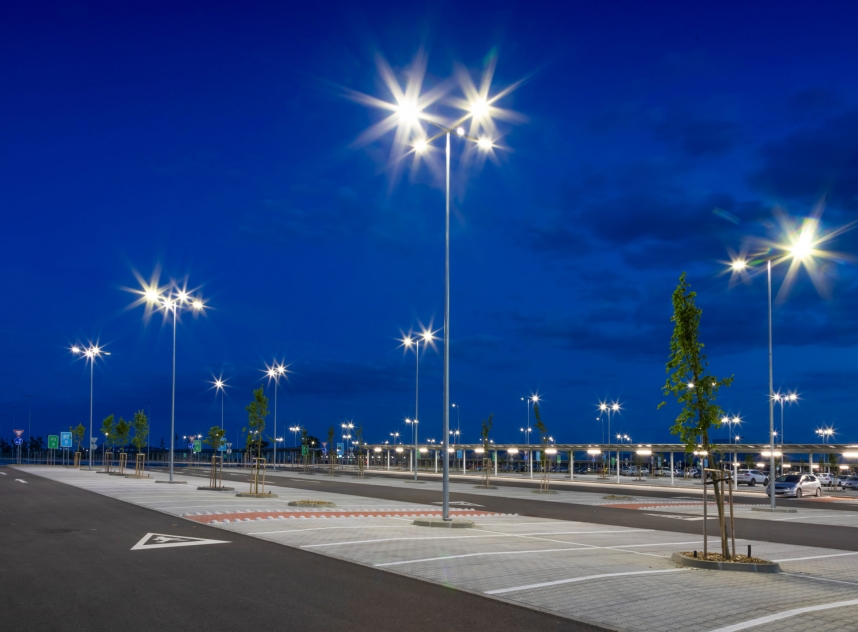 Big Modern Empty Parking Lot With Bright LED Street Lights At Night